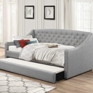 grey fabric bed with trundle