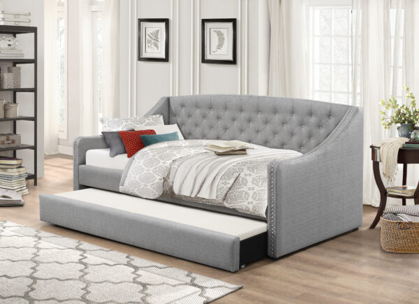 grey fabric bed with trundle